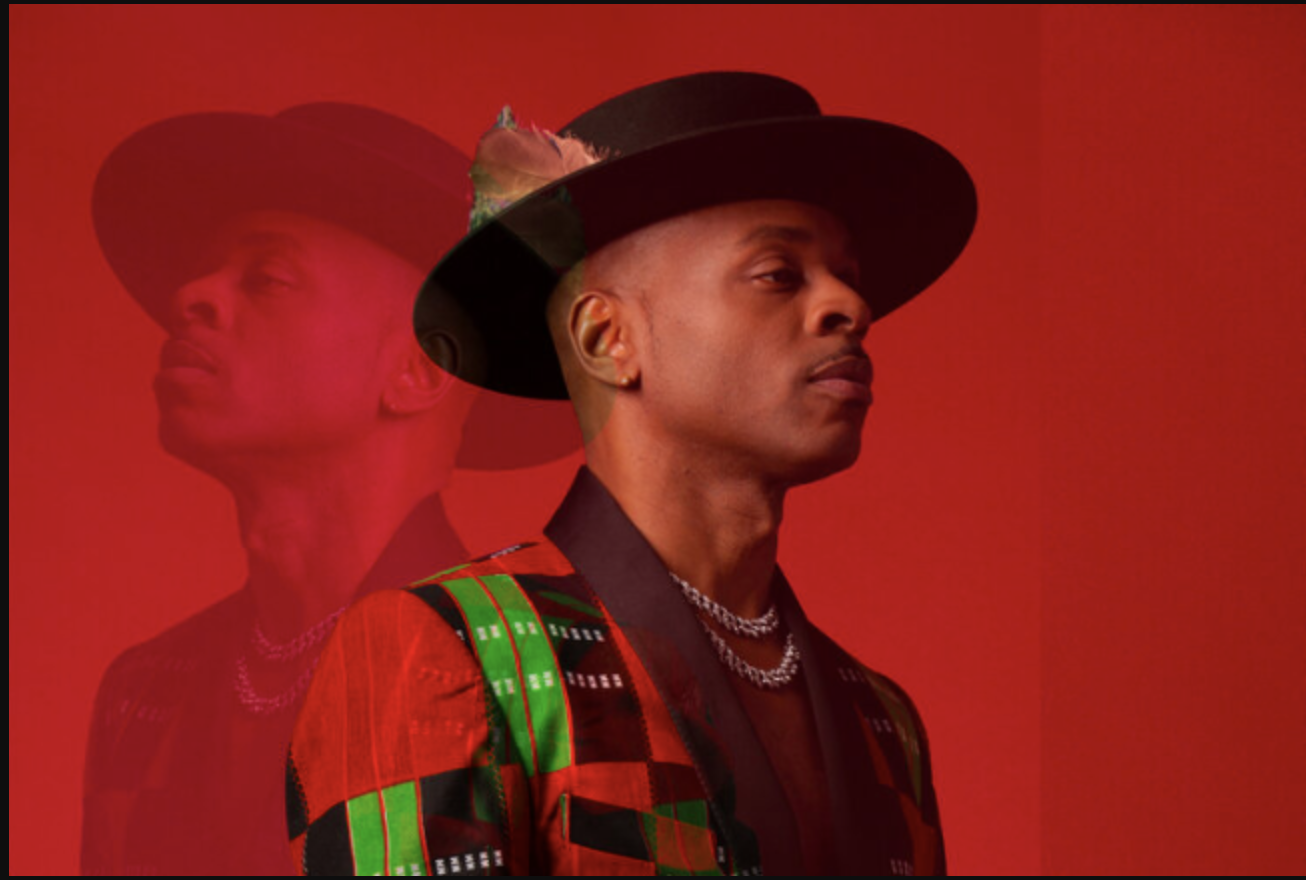 an image of the artist Stokley in a hat