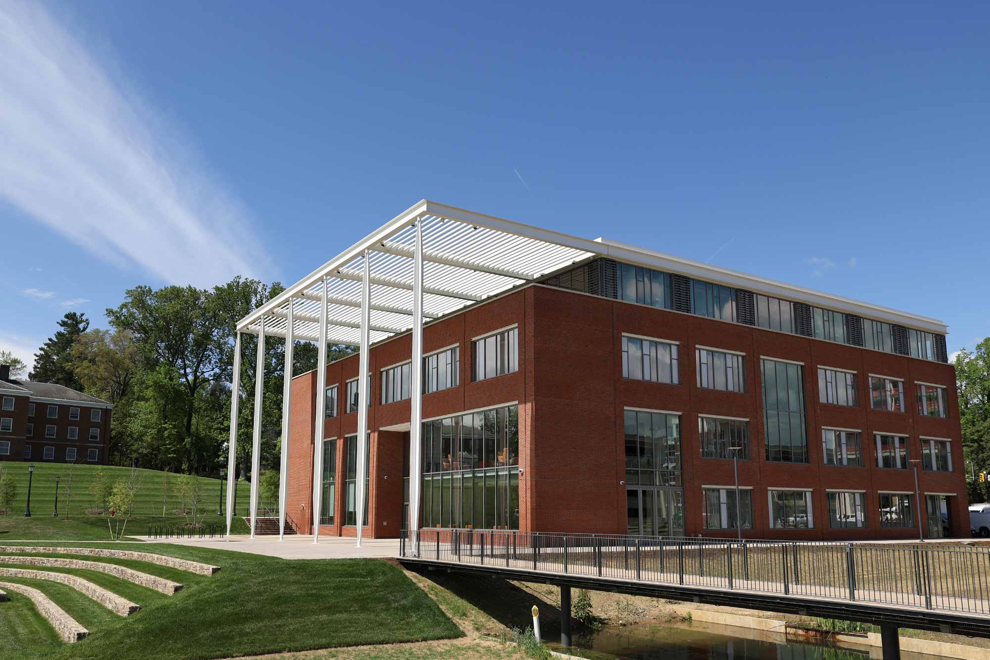 The School of Data Science building on a sunny day, against a clear blue sky.