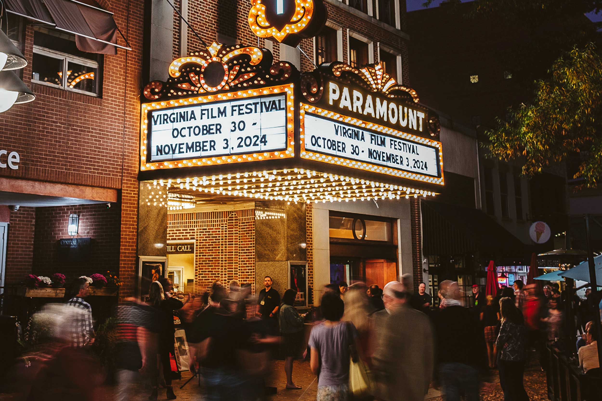 The marquee at the Paramount Theater is lit up and reads, "VIRGINIA FILM FESTIVAL OCTOBER 30 - NOVEMBER 3, 2024"
