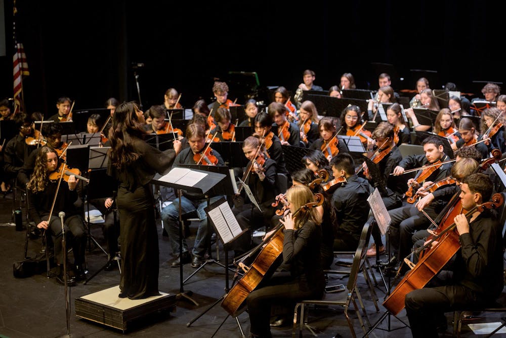 The Cavalier Symphony Orchestra sits down for their concert. 