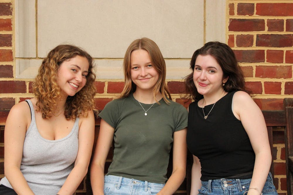 Three UVA Cavalier Daily writers are pictured