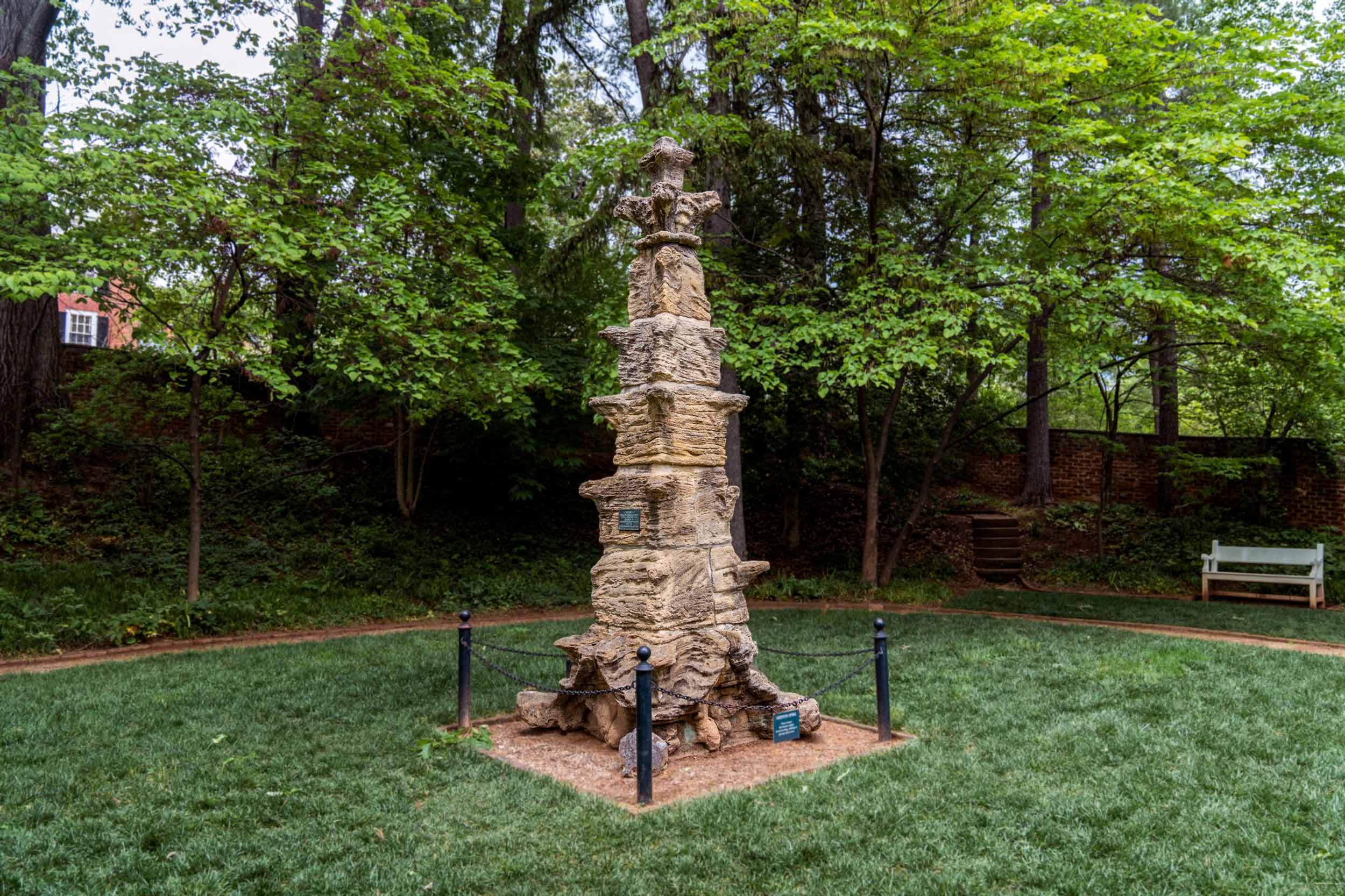 A picture of The Merton Spire, which is a tower carved from soft, porous limestone.