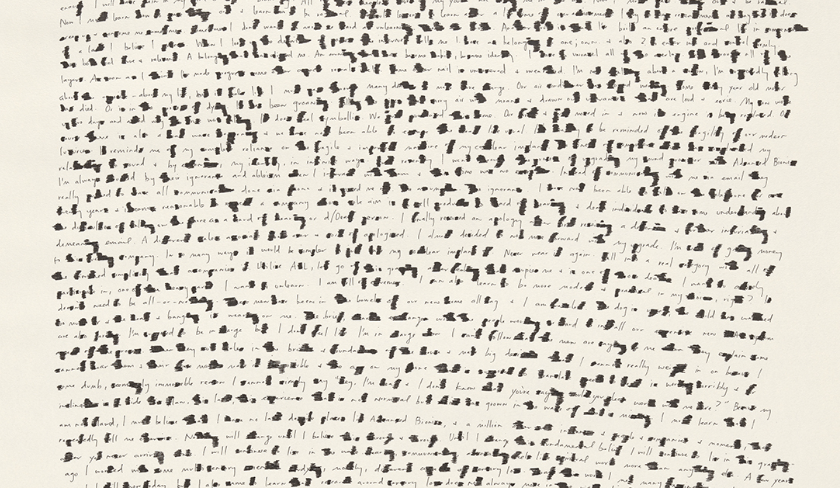 A cream sheet of parchment with lines of ink that seem to be words, but are unintelligible. 