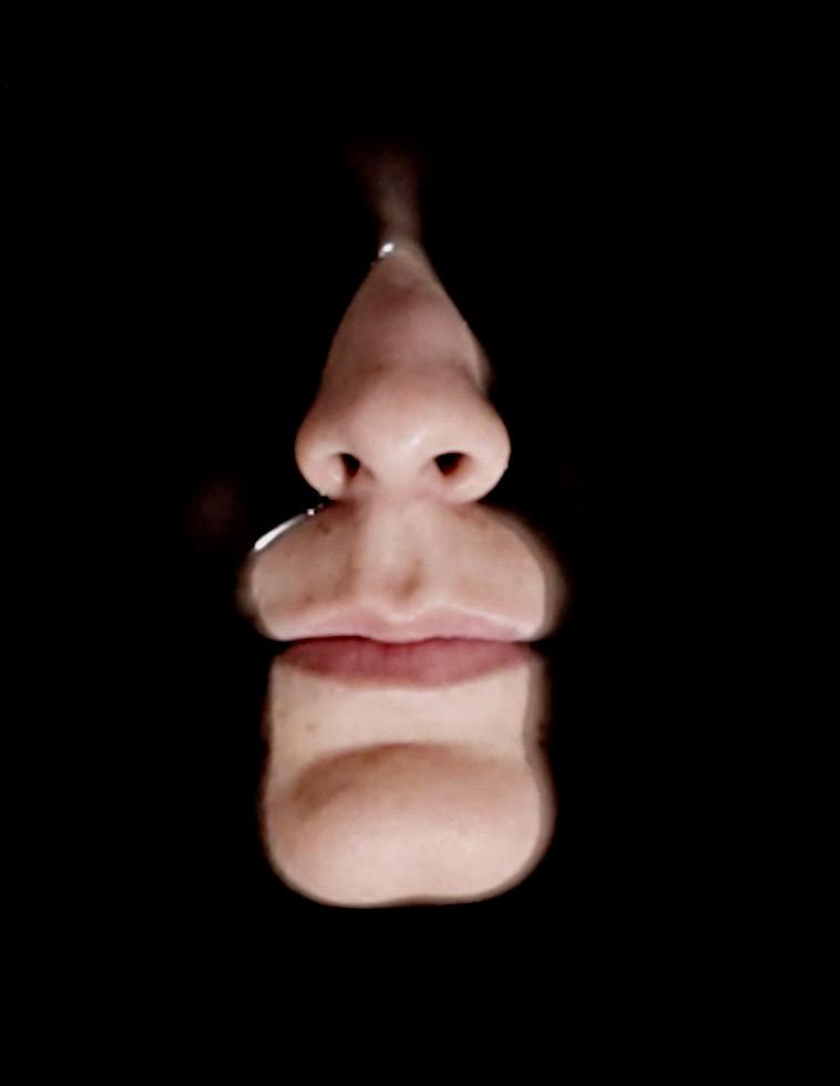 Mouth showing through liquid by Sepideh Dashti