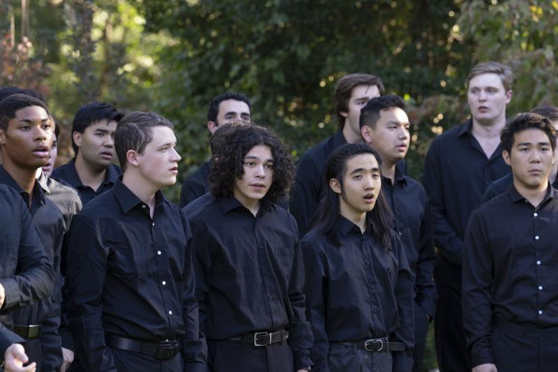 The University Singers warming up for their performance at Arts on the Hill at Carr’s Hill. (Photo by Dan Addison, University Communications)