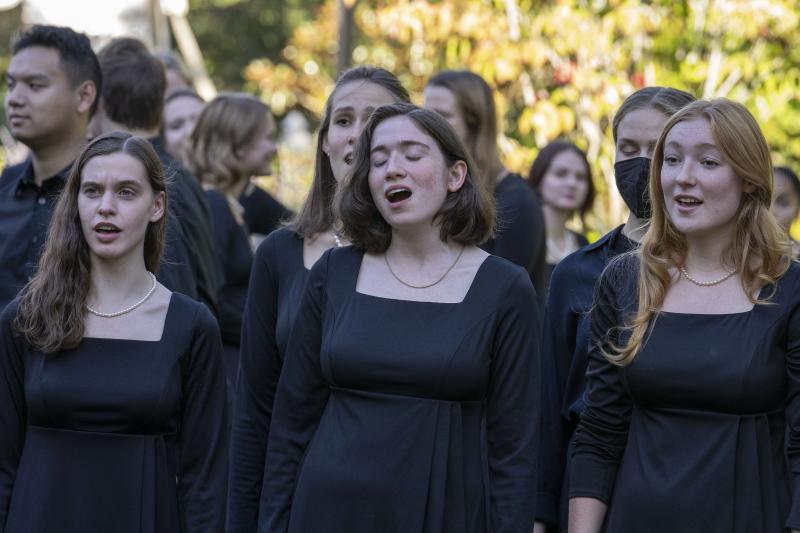 The University Singers warming up for their performance at Arts on the Hill at Carr’s Hill. (Photo by Dan Addison, University Communications)